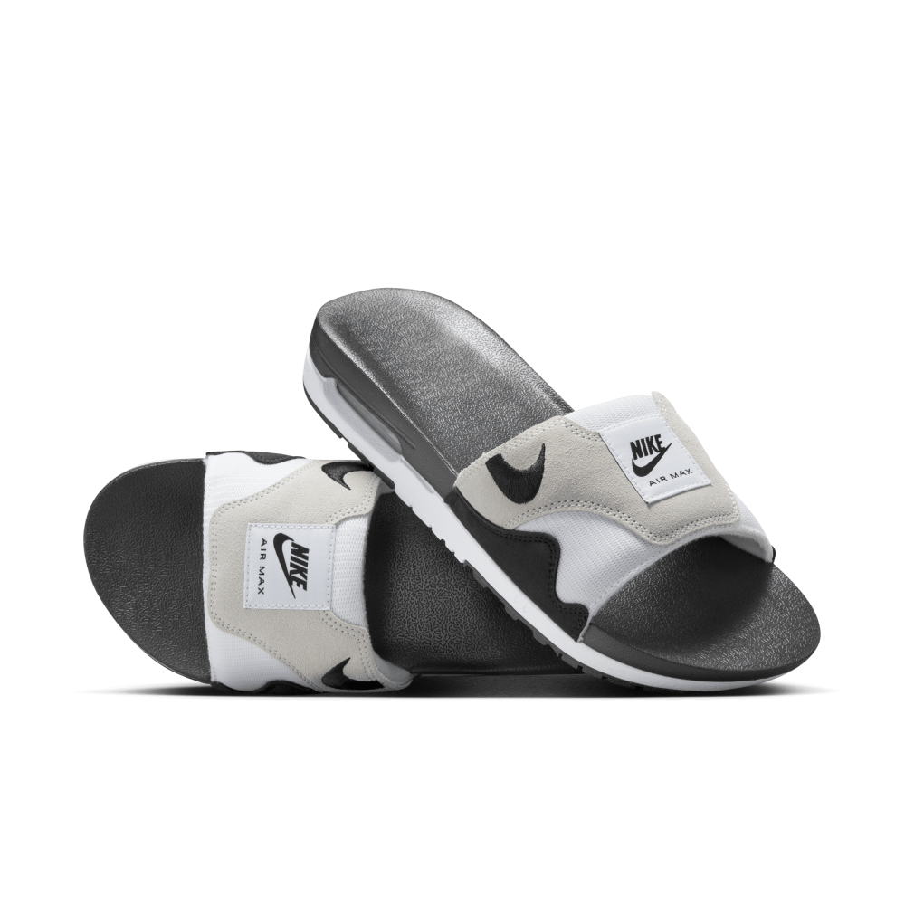 Black and grey nike slides online