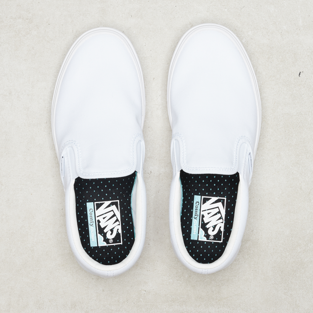 white slip on vans comfycush